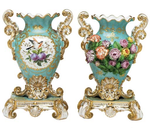 A PAIR OF JACOB PETIT PORCELAIN SKY-BLUE GROUND FLOWER-ENCRUSTED TWO-HANDLED VASES ON FIXED STANDS