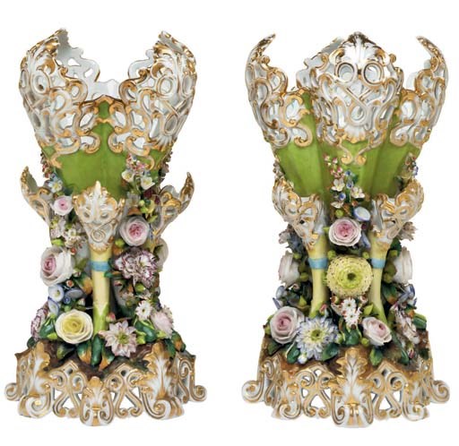 A PAIR OF RETICULATED PORCELAIN APPLE-GREEN GROUND FLOWER-ENCRUSTED VASES