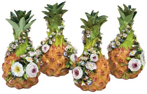 FOUR JACOB PETIT PORCELAIN FLOWER-ENCRUSTED BOTTLES AND STOPPERS