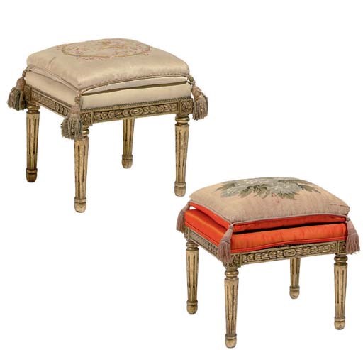 A NEAR PAIR OF FRENCH GILTWOOD TABOURETS