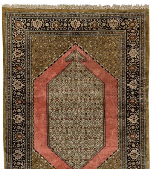 A SILK QUM RUG