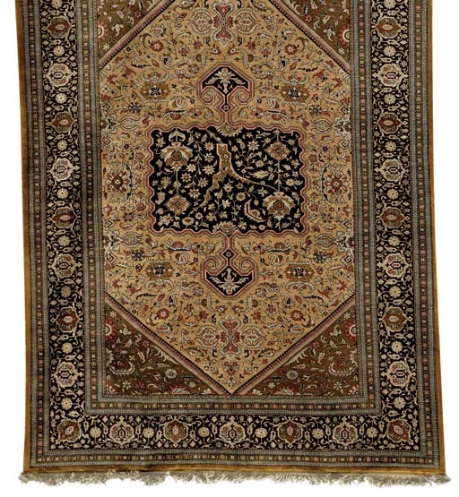 A SILK QUM RUG