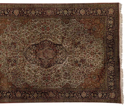 A SILK QUM CARPET