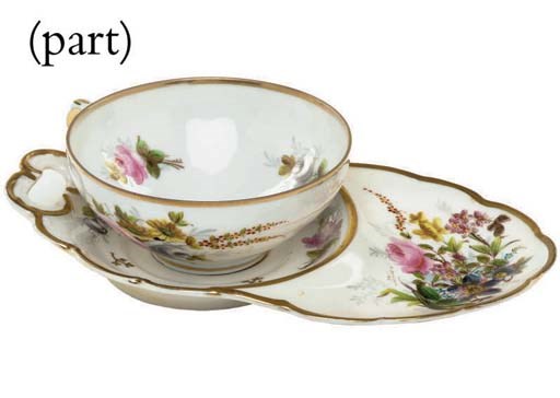THREE KUZNETZOV PORCELAIN TEACUPS AND SAUCERS AND A FRENCH BREAKFAST CUP AND SAUCER PLATE