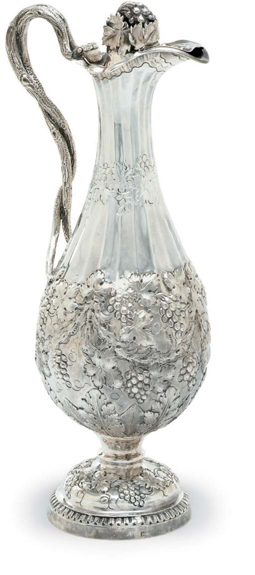 A SILVER CLARET JUG
