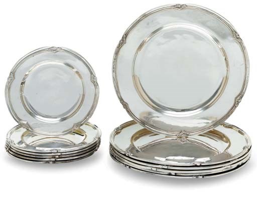 A SET OF SIX MEXICAN SILVER DINNER PLATES AND SIX BREAD PLATES