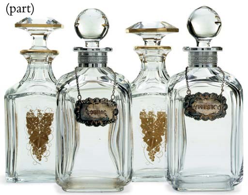 A BACCARAT GLASS ASSEMBLED PART STEMWARE SERVICE AND TWO PAIRS OF CUT AND PRESSED GLASS DECANTERS AND STOPPERS