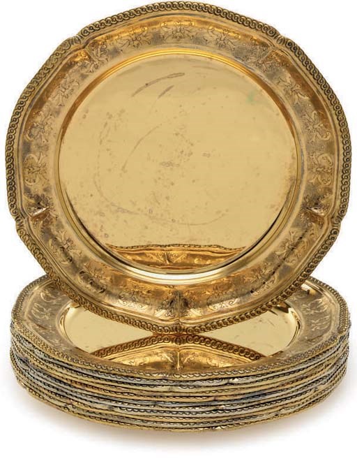 A SET OF TWELVE MEXICAN SILVER DINNER PLATES