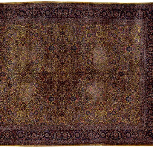 A SILK KASHAN CARPET