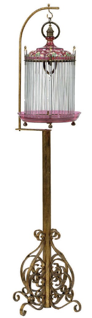 THREE CONTINENTAL COLORED ENAMELED AND COLORLESS GLASS BIRD CAGES