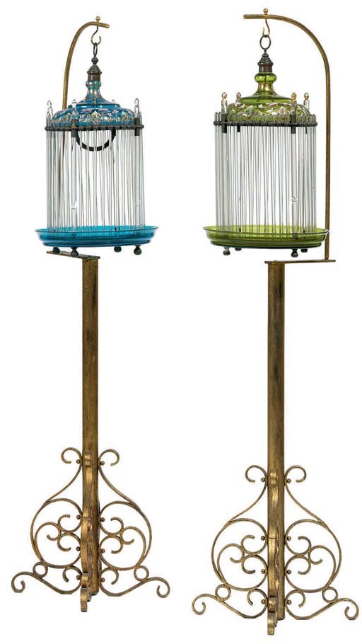 A PAIR OF CONTINENTAL RED GLASS, ENAMELED AND COLORLESS GLASS BIRD CAGES
