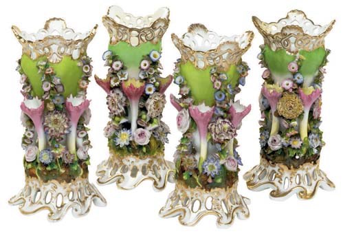 FOUR JACOB PETIT PORCELAIN RETICULATED APPLE-GREEN GROUND FLOWER-ENCRUSTED VASES