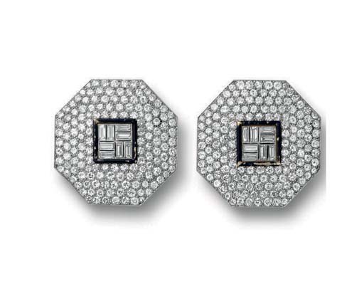 A PAIR OF DIAMOND AND ENAMEL SHIRT STUDS