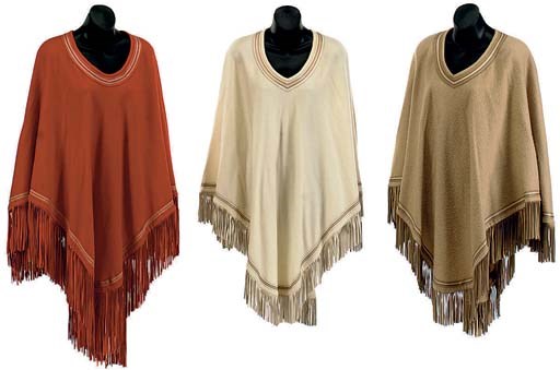A GROUP OF THREE HERMÈS CASHMERE AND WOOL PONCHOS WITH MATCHING LEATHER FRINGE