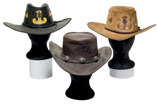 A GROUP OF THREE COWBOY HATS