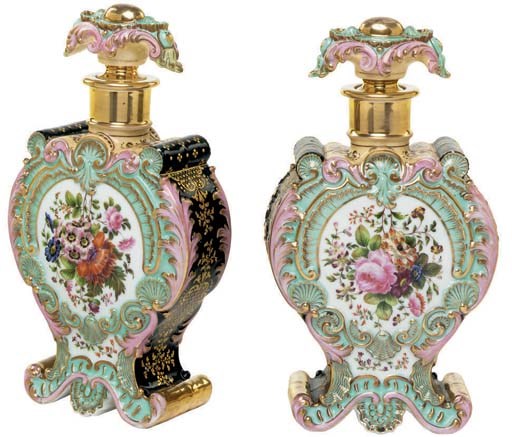 A PAIR OF JACOB PETIT PORCELAIN POLYCHROME SCENT-BOTTLES AND STOPPERS
