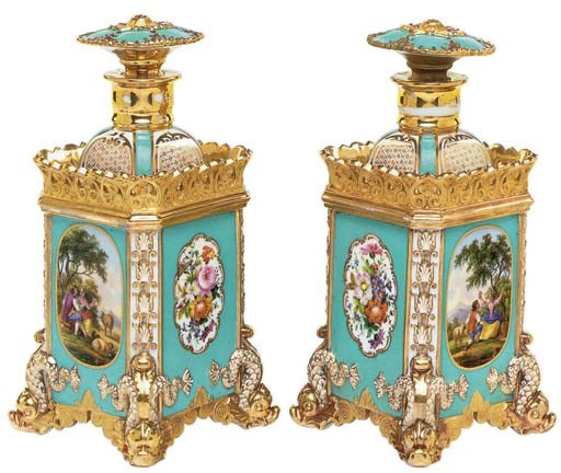 A PAIR OF JACOB PETIT PORCELAIN BLUE-GROUND SCENT-BOTTLES AND STOPPERS