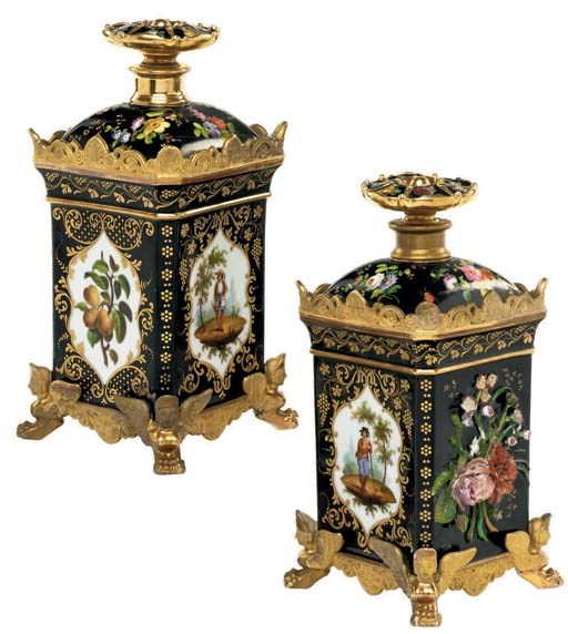 A PAIR OF JACOB PETIT PORCELAIN FLOWER-ENCRUSTED BLACK-GROUND SCENT-BOTTLES AND STOPPERS