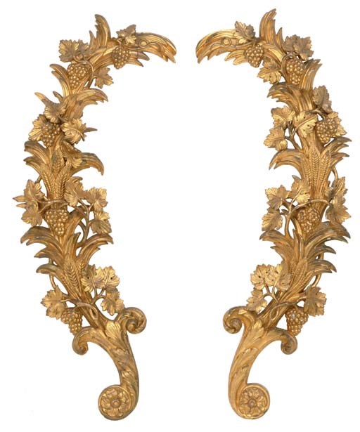 A PAIR OF CONTINENTAL GILTWOOD WALL CARVINGS