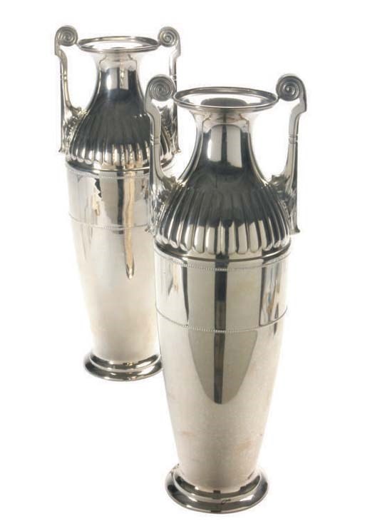 A PAIR OF SILVER-PLATED TWO HANDLED VASES,