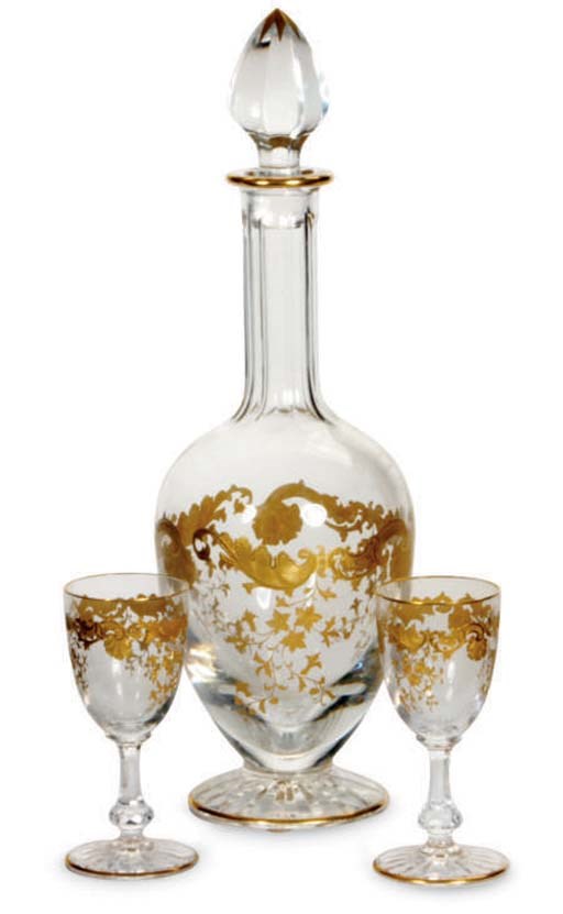 A FRENCH GILT GLASS DECANTER AND STOPPER,