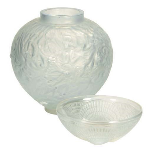 A FRENCH MOLDED GLASS VASE AND A MOLDED GLASS BOWL,
