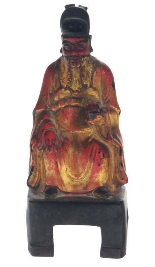 A CHINESE BRONZE FIGURE OF A BEARDED IMMORTAL,