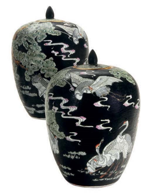 A PAIR OF CHINESE FAMILLE NOIR GINGER JARS AND COVERS,