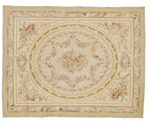 AN AUBUSSON STYLE CARPET,