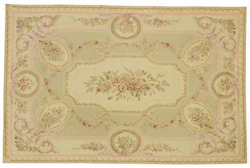 AN AUBUSSON STYLE CARPET,