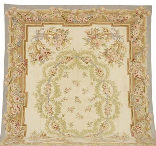 AN AUBUSSON STYLE CARPET,