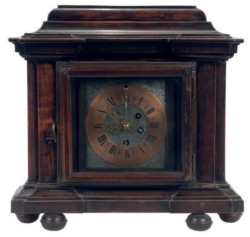 A CONTINENTAL WALNUT BRASS AND PEWTER MANTLE CLOCK,