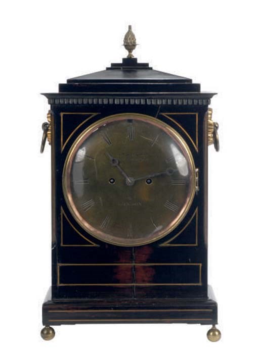 AN ENGLISH BRASS INLAID EBONISED MANTEL CLOCK,