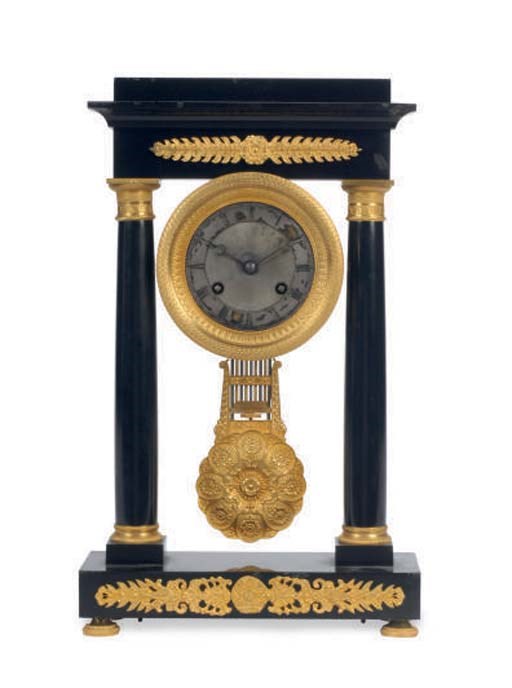A CHARLES X GILT-BRONZE MOUNTED EBONISED TABLE CLOCK,