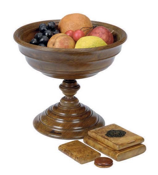 AN ENGLISH TREEN COMPOTE WITH ASSORTED PLASTER FRUIT,