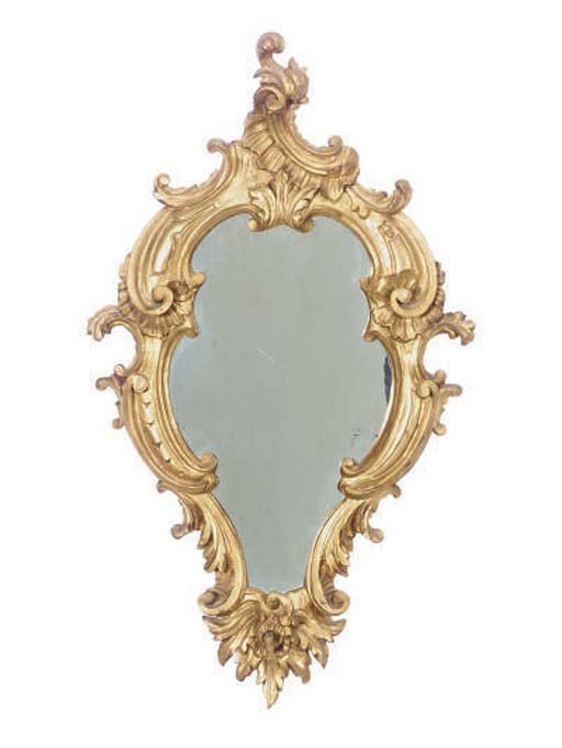 A PAIR OF CONTNENTAL CARVED GILTWOOD WALL MIRRORS,