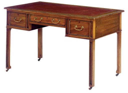 AN ENGLISH CARVED MAHOGANY WRITING DESK,