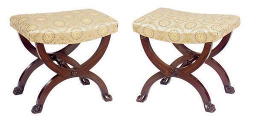A PAIR OF MAHOGANY CURULE FORM STOOLS,