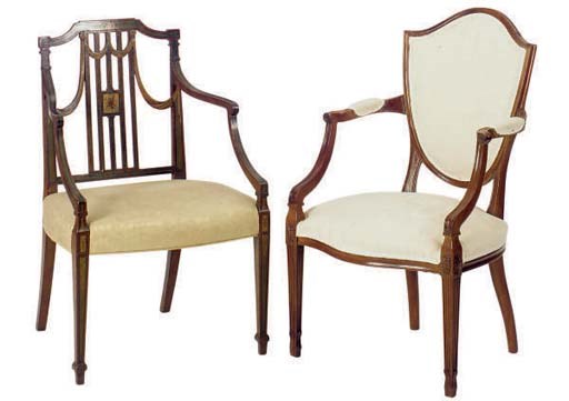 A LOUIS XVI CARVED WALNUT FAUTEUIL,