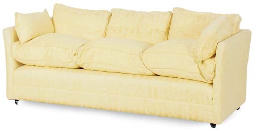 A YELLOW UPHOLSTERED SOFA,