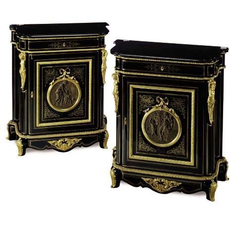 A PAIR OF NAPOLEON III GILT BRONZE MOUNTED EBONIZED CONSOLE CABINETS,