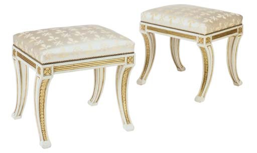 A PAIR OF CREAM PAINTED AND PARCEL-GILT TABOURETS,