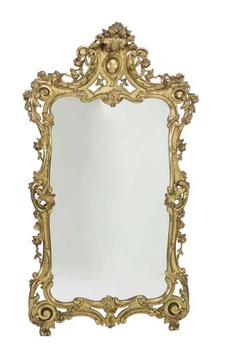 A CONTINENTAL CARVED GILTWOOD WALL MIRROR,