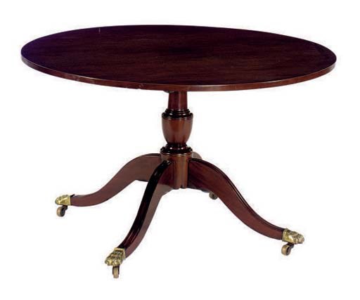 A REGENCY MAHOGANY CIRCULAR TILT-TOP BREAKFAST TABLE,