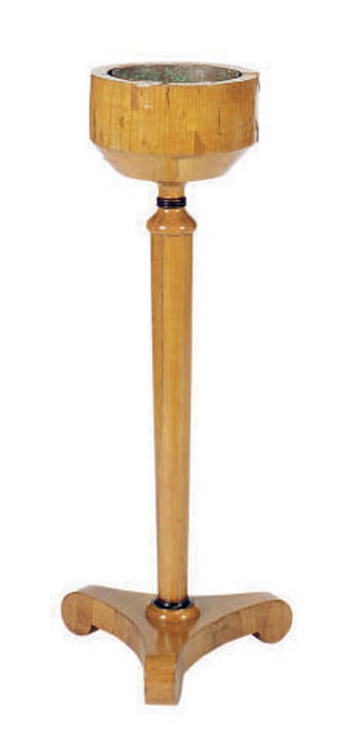 A BIEDERMEIER FRUITWOOD AND EBONIZED JARDINIERE STAND,