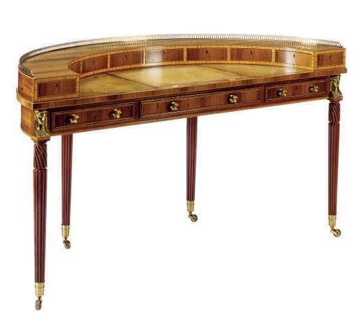 A GILT-METAL MOUNTED ROSEWOOD, PUDOUK, SATINWOOD CARLTON HOUSE WRITING DESK**,
