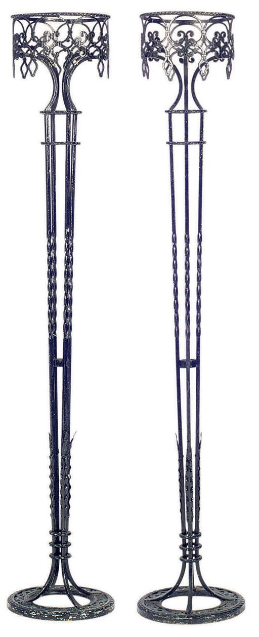 A PAIR OF BLACK PAINTED WROUGHT IRON JARDINIERES,