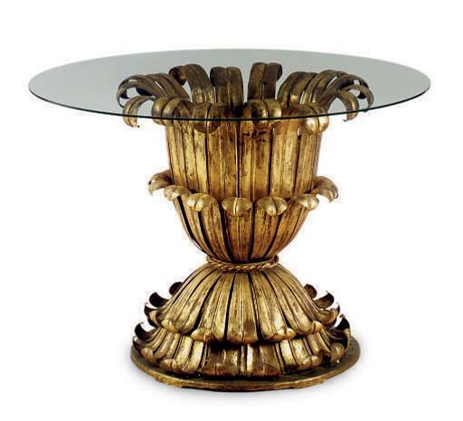 A GLASS TOPPED GILT-METAL CENTER TABLE,