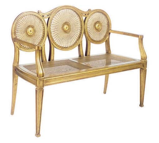 A CONTINENTAL GILTWOOD AND CANED SETTEE,