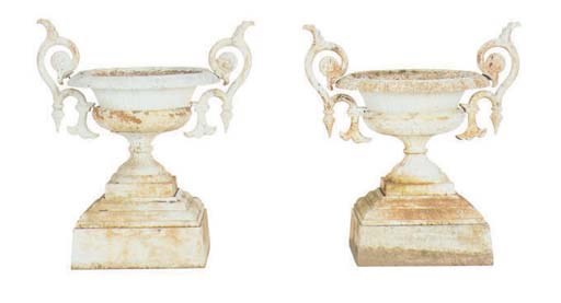 A PAIR OF WHITE PAINTED CAST IRON GARDEN URNS,